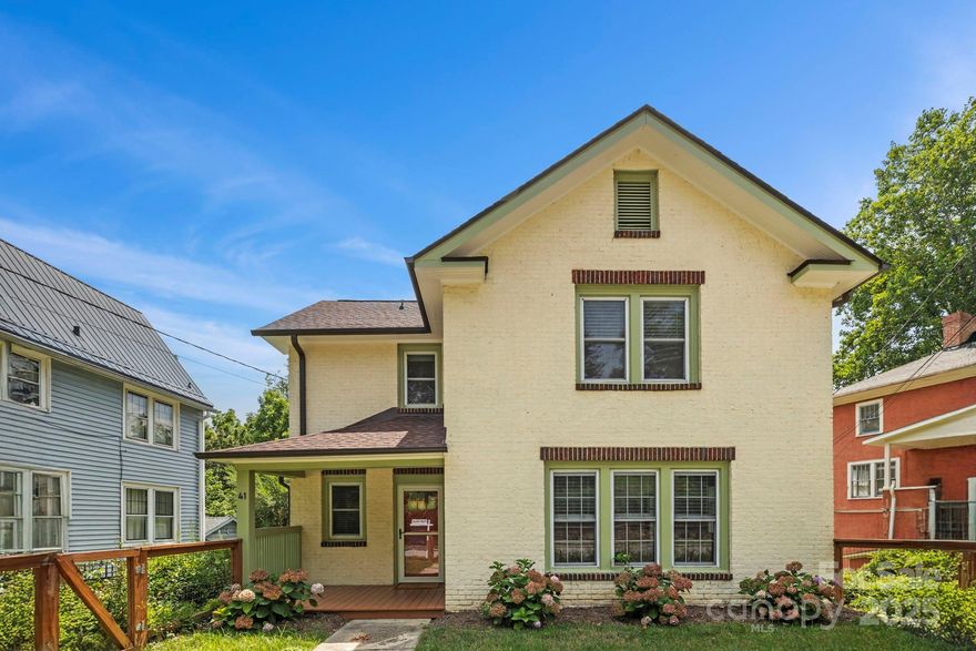 Discover timeless elegance in this stunning 1928 brick home, nestled in the desirable Kenilworth neighborhood. Boasting 3 bedrooms and 2 baths, this home exudes character with rich hardwood floors, a cozy wood-burning fireplace, and an abundance of natural light throughout.  The inviting front porch and spacious back deck offer great spaces to relax. Whether you're enjoying your morning coffee or unwinding at sunset. Full of character and potential, this home blends classic craftsmanship with a prime location just minutes from Asheville's vibrant downtown. Don't miss the opportunity to make this timeless property your own!