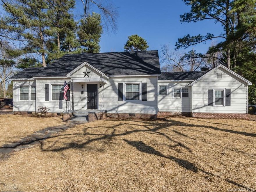 FRESHLY REMODELED CHARMER! Too much to list, come see me!  This home has a new gourmet kitchen, stainless steel appliances, granite counter tops, subway tile back splash & tile floor, original refinished hardwoods & the great room has a trey ceiling & fireplace.  Awesome sun room. A full staircase leads into a huge attic that could be made over into a future master suite or bonus room!  New architectural shingle roof & fire pit for relaxing. Large storage shed. Convenient to downtown Clover.