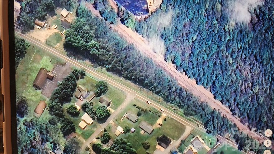 Zoned MID Unimproved Commercial 2.62 tract on Carbon City Rd convenient to Glen Alpine, downtown Morganton and I-40. High traffic Visibility. Wide variety of commercial, business, residential and office uses. (See Zoning permitted uses attached in Disclosures) Easy to show!