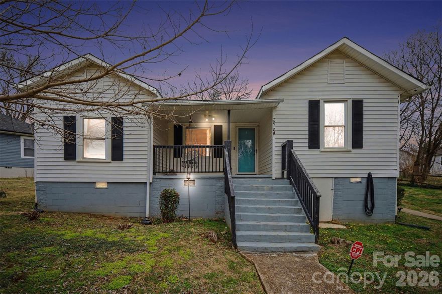 Charming 3BR/2BA cottage-style home with preserved character and thoughtful updates throughout! Refinished hardwoods in the living room. The primary suite with private bath. Bedroom/Office features Limestone-washed (non-Functional) fireplace for a unique charm. Renovated kitchen features wood cabinetry, butcher block countertops, subway tile backsplash, and stainless appliances including refrigerator. Updates include luxury vinyl plank flooring, updated the electrical system. Located on a quiet street just steps from the neighborhood park with walking trails and covered picnic areas. Move-in ready!