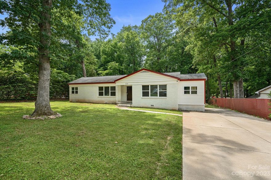 Brick ranch nestled in east Charlotte, minutes from Uptown Charlotte & Plaza Midwood. Freshly painted interior open a bright, the beautiful wood floors flow throughout the living areas, adding warmth & character to the home. The newer energy efficient windows let the natural light flood. Home has 3 bedrooms, 2 renovated baths, & a small office, perfect for those who work from home or desire a dedicated office or workspace. Unheated mudroom/laundry room offer additional storage.  The HUGE lot provide plenty of outdoor space for gardening, entertaining, and, according to city of charlotte zoning, could be development into a triplex or a duplex. The expansive driveway offers abundant parking for multiple vehicles. NO HOA gives you the freedom to personalize without restrictions. Home has newer HVAC. Per charlotte meck zoning, the property size & zoning allows for property to be expanded into a duplex or triplex.
