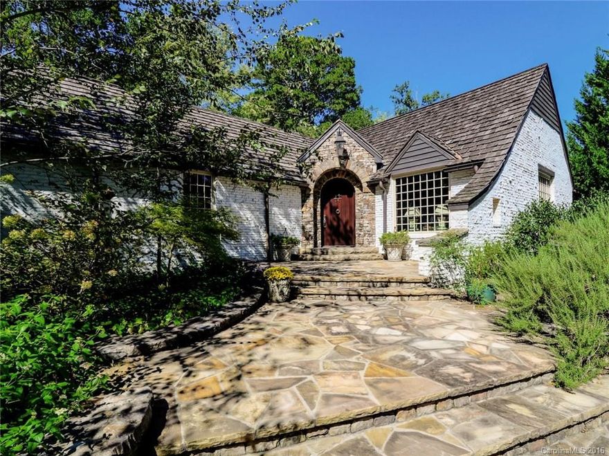 Charming English cottage with 50 year Cedar Shake roof. Totally rebuilt. Nothing like it in town! Copper gutters, generator, security with cameras, Russound Audio Video system throughout, 4 fireplaces, custom cabinetry, wormy chestnut paneling &amp; bookcases, open top of the line kitchen. Lower level playroom, craftroom &amp; bath. Guest Cottage with 1 bedroom and 1 bath- 906 square feet, logia with fireplace, bedroom above garage with one bath - 411 square feet.