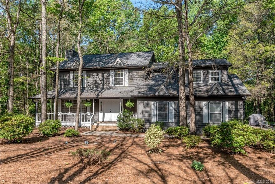 Great Location close to shopping and entertainment & great schools - This 4 bedroom home is move in ready.  Kitchen has beautiful counters, tile back splash, gas stove & views of private wooded back yard. Rocking chair front porch & screened-in back porch for your outdoor entertaining & relaxing. Great room has fireplace & wet bar, den is open to kitchen. Large master bedroom, WIC and relaxing tub. Home is on a cul-de-sac for added privacy. 2 car garage with added driveway area for extra parking