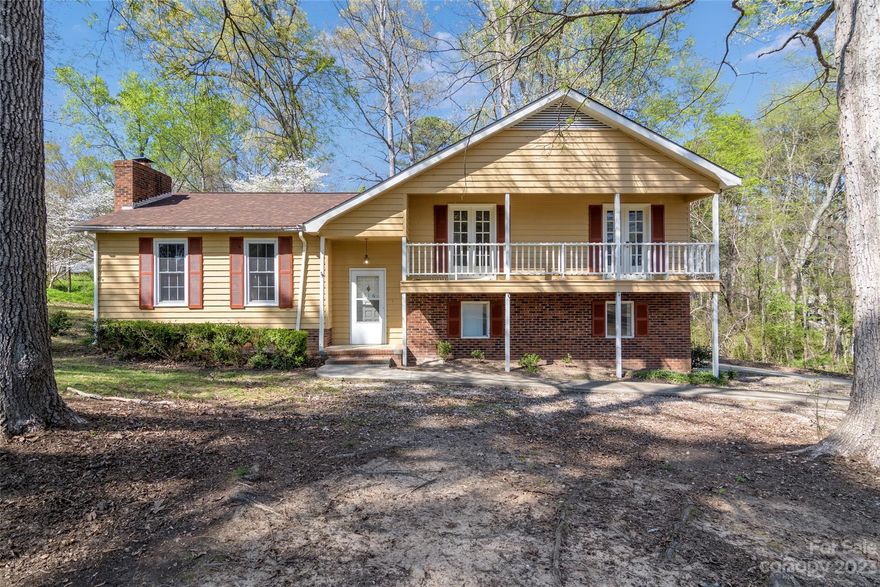 Nestled beneath a dense canopy of pine and oak trees is this sweet golden nugget of a house. Sat upon approximately 3/4 of an acre, this Craig Brow neighborhood home is ready for you to tour. It has a modest split level plan providing 3 bedrooms, 2 bathrooms and 1/2 bathroom. 2 of the secondary bedrooms have a balcony that spreads between the two allowing relaxation while the neighborhood provides plenty of privacy. The well pump and line have newly been replaced along with the heating element on the HVAC. There is new carpet throughout and the floor has been replaced in the laundry and lower level bath. Throughout, there is also fresh paint in the interior. Come grab this little gem located in beloved Chester, SC and call it your new home.