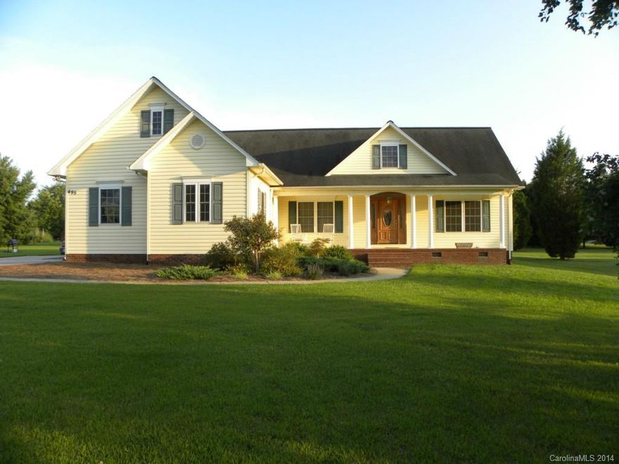 FOR HIM:  1600 sq. ft. workshop/garage out back.  Tons of storage room up top.  Two large (tall) garage doors plus smaller garage door on side.

FOR HER:  Beautiful 3 bed/2bath on 1 acre in country setting with rocking chair front porch. This home has 2 large bonus rooms upstairs with there own heat/ac.  Downstairs has bedrooms, open kitchen, dining and living room with gas logs. New hardwoods installed throughout house