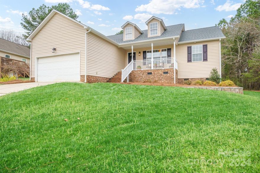 Welcome to this charming  and very well maintained ranch that sits atop a slight hill with beautiful view of the peaceful cul de sac. This home has it all!  To begin, on the outside, there is inviting front porch, in the back you'll find a nice deck that steps down to a generously sized paver patio, perfect for grilling, also a custom built fire pit, and finally raised garden beds for the gardening enthusiast (seller's have enjoyed growing herbs, fruits, veggies and flowers). Inside you'll find a convenient split floor plan that includes an upgraded bath floor, a flex room to use for dining or an office,  a built in banquette, and custom built ins in the nursery.  Kitchen appliances are all on the newer side (Range & Microwave 2016, Refrigerator 2021, Dishwasher 2022)Still not enough, take a look at the oversized garage that easily holds 2 cars, with room to spare for a freezer or refrigerator, and tools galore. NEW ROOF in 2020! All this, plus a HOME WARRANTY! Will not last long!