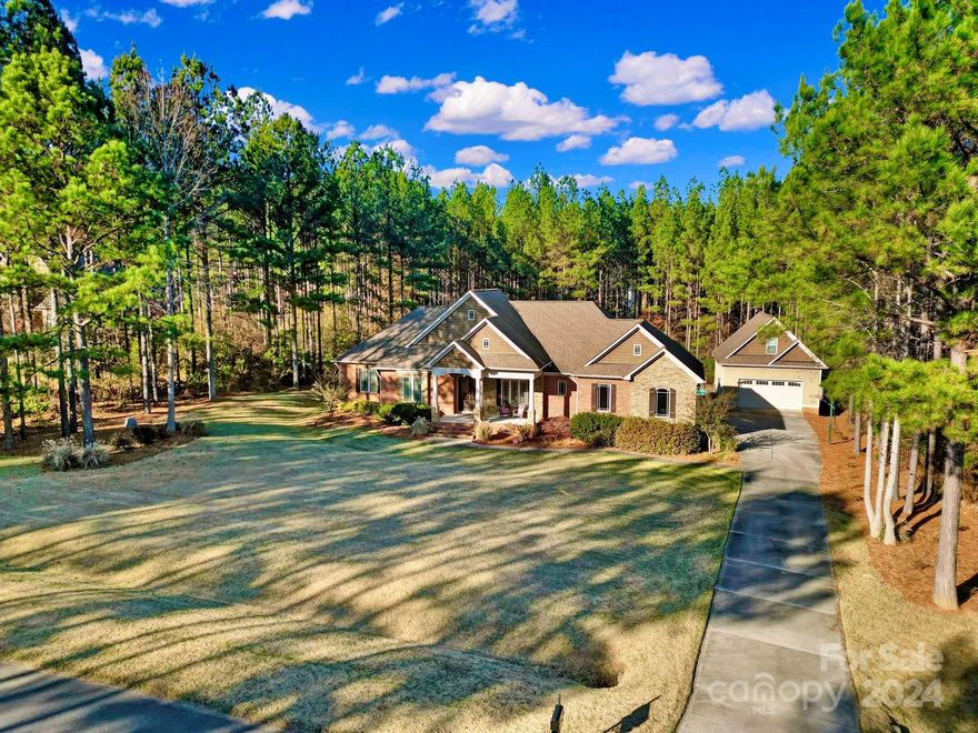 Welcome to Catawba Shores Estates! A community that is surrounded by the Catawba River with trails, community pool, and a  canoe & kayak launch.  This ranch home sits beautifully on an acre lot surrounded by trees and flowers featuring a pool and 2 car Detached garage with finished bonus room above. The house is filled with plenty of natural light making it bright and airy while creating a warm and inviting atomosphere.  Youll love the gourmet kitchen with the many pull out drawers, double oven and granite countertops. The kitchen also has reverse osmosis water filtration. The bedrooms are large and spacious.  Enjoy your mornings and evenings on the screen porch or back patio.  The backyard features a fiberglass saltwater pool with firepit.  Underground invisisble fencing in front and back yard.  The location is great to so many areas.  Close to Rock Hill & I77 or Indian Land! So much to love!  Make your apt for a private showing today!