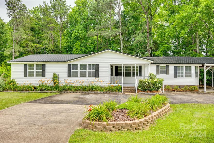 Nestled on over 1.5 acres, this charming 3-bedroom, 2-bath ranch home offers a unique opportunity for airplane
enthusiasts with no HOA and no restrictions. Conveniently located near York Aviation off Highway 321 and close to the Highway 5 Bypass, this property boasts spacious rooms perfect for family gatherings. Enjoy peaceful mornings on the rocking chair front porch, and make use of the nice, detached building and ample parking space. The well-maintained home features fresh paint and is ideal for those looking to bring their chickens and embrace a rural lifestyle. Large fenced in back yard for those four legged friends. Don't miss out on this rare gem! This property can be purchased separately or along with 2560 Goins Road which is also on the mls. Wonderful opportunity to live close to family while having your own place.