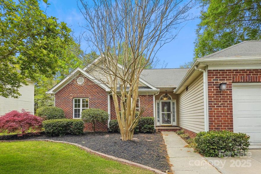 New LVP floors just installed throughout this wonderful ranch home located in Rock Hill's Mabry Park. This absolutely charming and well maintained home features vaulted ceilings in the great room, a separate breakfast room and large dining area. The kitchen boasts updated stainless steel appliances and has plenty of counter space in addition to the breakfast bar.  The primary suite includes a tray ceiling, walk-in closet, double sinks, separate shower & garden tub! New LVP floors throughout! Relax on the covered rear porch, overlooking the newly landscaped and fenced yard. Conveniently located close to shopping, schools and Piedmont Medical Center! Hurry to see this fabulous home.