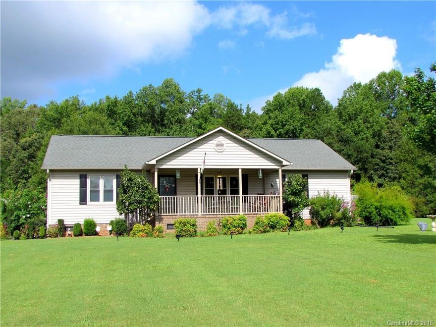 You've been looking for this one. Yes, it has everything you need. Three bedrooms, two bathrooms, two-car carport, and over 1500 square feet. But this one's also got everything you've ever wanted. A beautiful, inviting kitchen, gorgeous wood flooring, an outdoor space perfect for both summer barbecues and winter bonfires, a pool to jump right into after you've unpacked the last boxes, oh, and three and a half acres of land to call your own. Better hurry, this house is the dream home come true.