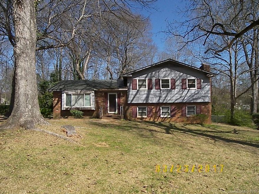 Spacious split level with five bedrooms, two full and one half baths. Den with fireplace. Laundry on lower level. Hardwood floors in living room/dining room, two bedrooms and hall on upper floor. Large picture window in living room. Highest and best due along with Multiple Offer Form NO LATER THAN 8AM MONDAY APRIL 3, 2017.  Please note that any offers submitted without the completed MOF or past the deadline will not be considered. Property is exempt from disclosure per NCGS 47E-2.