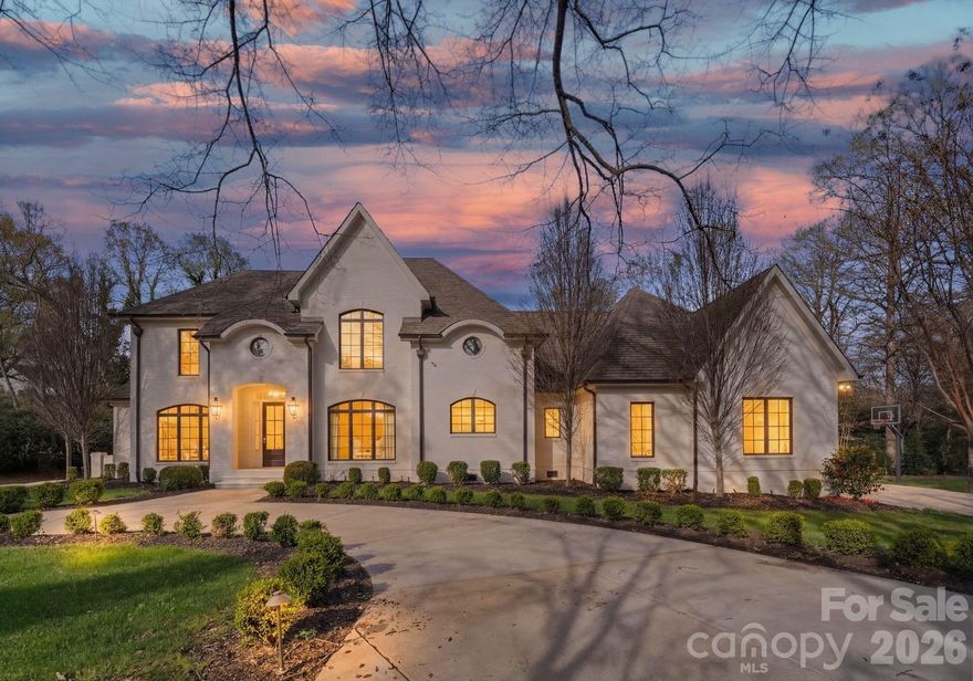 Welcome to 2043 Sharon Ln-a hidden gem in a coveted location! This stunning, private, all-brick custom, built in 2017, is nestled amongst the trees off a long drive. Enter from the covered front entry into a welcoming foyer, with an elegant curved staircase. A gorgeous study with built-ins and a formal dining room flank the entryway. Custom gourmet kitchen with large marble island and Thermador appliances, opens to breakfast area, family room, and keeping room, both with fireplaces. Drop zone, office area, large butler's pantry, and oversized laundry room are located off kitchen. Vaulted keeping room with fireplace overlooks an amazing covered porch with built-in grilling station and adjacent fire pit. A saltwater, heated pool with waterfall features was added in 2022 to enhance the private backyard sanctuary. The primary suite on main boasts a luxurious bathroom with dual walk-in closets. Upper level has three large bedrooms each with direct access to beautiful baths, a large bonus room, and area plumbed for 2nd laundry. Large walk-in storage area can be converted to additional living area. This very private retreat is minutes from Southpark and Uptown.