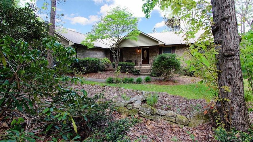 One level living on nearly 6 ac w/ native plants, creeks, multiple garden areas, and rock outcroppings. Paths follow along the creek or through the woods to “secret” spots where you can enjoy the cascading water and surround yourself with nature. This one-owner home features a split plan, large eat-in kitchen, dining room, great storage, vaulted LR, and screened porch. EZ care exterior and 3 car garage. Only 5 min to the village of Flat Rock or another 5 min to downtown Hendersonvile.