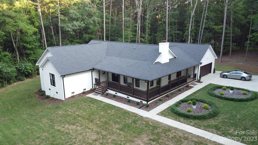 Step into a captivating blend of classic charm and contemporary allure with this beautiful, bright, and modern ranch-style home. Large windows bathe the interior in natural light, creating a warm and inviting ambiance.
Prepare to be amazed by the remodeled kitchen, boasting new cabinets, stainless steel appliances, and elegant granite countertops. A huge pantry provides ample storage, fulfilling all your organizational needs.
The Primary Bedroom is a true luxury, equipped with not one, but two closets. 

Yet, the crowning jewel of this residence lies in its dreamlike yard, a true haven of tranquility and beauty. Step outside to experience the allure of the new deck, perfect for relaxation and enjoyment. The property also includes a substantial attached garage and additional upper-level storage, ensuring practicality meets style.Welcome to your dream home, where classic sophistication meets modern comfort.