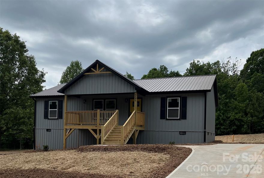 This 3 bedroom, 2 bath new construction home offers an open-concept layout with a split-bedroom plan. 

Features include a vaulted ceiling in the open concept kitchen and living area, a kitchen island, solid wood countertops, and LVT flooring throughout. The kitchen also offers soft-close drawers and a tile backsplash.

The primary suite includes a bathroom with double sinks, a tiled shower, and a walk-in closet. You’ll also find a separate laundry room for added convenience.

Enjoy the outdoors on the large back deck, ideal for relaxing or entertaining, all located in the George Hildebran area of Connelly Springs, NC.

This home is being offered as a spec home with several upgraded features by your premier local builder, Arkase Homes.