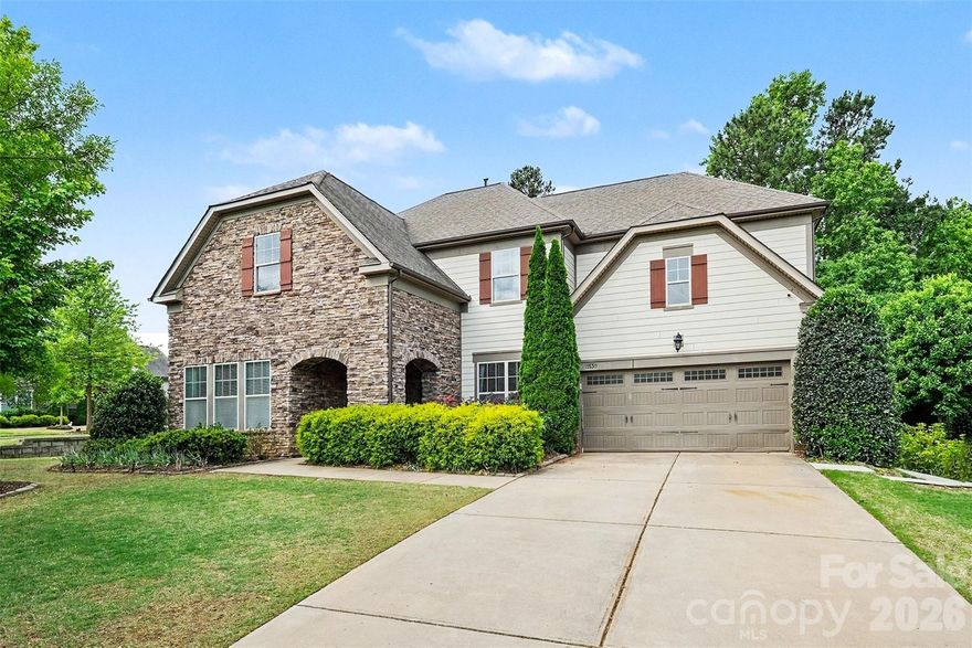Located on a quiet cul-de-sac, this NE-facing turn-key home is priced to sell and loaded with luxury upgrades, offering exceptional value in one of the area’s most desirable communities. Homes with this level of customization, condition, and attention to detail rarely hit the market at this price point — and they don’t last long.

Step inside to a stunning custom tile entryway that opens to a main level adorned with hardwood floors, recessed lighting, and elegant crown molding. The living room features a custom lighted and wired built-in, creating the perfect focal point for relaxing or entertaining. A dedicated office with its own custom built-in provides a refined and productive workspace.

The heart of the home is a beautifully refreshed kitchen with new paint that seamlessly flows into the main living areas, all equipped with surround sound that extends to the outdoor screened porch — ideal for effortless indoor-outdoor living.

Upstairs, solid hardwood flooring continues throughout along with an oversized media room featuring custom projector wiring and integrated speakers, creating the ultimate home theater or entertainment space.

The luxurious primary suite is truly unforgettable, showcasing a spa-inspired bathroom with floor-to-ceiling marble, a frameless glass shower, freestanding soaking tub, and radiant heated marble floors. Custom solid wood his-and-hers vanities with quartz countertops add both elegance and functionality. Separate custom closets and designer roller shades complete this exceptional retreat.

Additional highlights include a custom walk-in pantry and thoughtfully designed shelving and drawer systems throughout the home, offering exceptional organization and functionality.

Step outside to enjoy a private, fully fenced backyard featuring custom landscaping, a paver patio, and a charming garden path — the perfect setting for relaxing evenings or entertaining guests. Situated on a peaceful cul-de-sac lot, the home offers added privacy and a serene setting. A full lawn irrigation system with additional drip lines keeps the grounds lush and vibrant year-round.

The community is loaded with amenities including a clubhouse, pool, tennis and basketball courts, walking trails, playground, and private boat launch access to Lake Wylie.

This is a rare opportunity to own a meticulously upgraded, truly move-in ready home where every detail has been carefully curated. Schedule your private tour today before this one is gone!