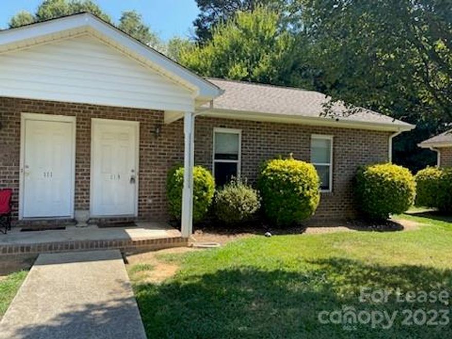 Quaint brick duplex. Open living room and kitchen area with two bedrooms and one full bath. This home includes the stove, refrigerator, microwave, and an attached storage unit. Lawn maintenance is included. Come see it today! Agent only available M-F 8:30am-5:30pm. Any inquiries after that time will be addressed the following business day.