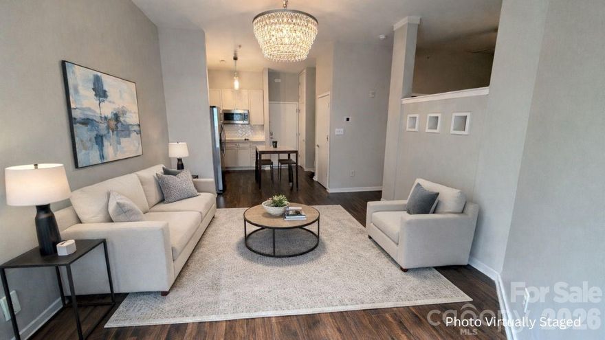 Second-floor South End condo delivering true walkable city living in one of Charlotte’s most in-demand neighborhoods. Located just steps from the Rail Trail, light rail, top-rated dining, and breweries, this unit offers immediate access to the energy and convenience that define South End.

Inside, a bright and efficient layout maximizes every square foot, featuring an open-concept living space ideal for both everyday living and entertaining. The kitchen is equipped with white cabinetry and stainless steel appliances, seamlessly connecting to the main living area. The updated bathroom showcases a sleek glass-enclosed shower with modern tile finishes, creating a clean, elevated feel.

Major system upgrades completed in 2025, including a new HVAC, water heater, and washer/dryer, provide peace of mind and long-term value. Positioned on the second floor, the unit offers a balance of privacy and accessibility within the community.

This presents a compelling opportunity for buyers seeking a low-maintenance primary residence, a lock-and-leave lifestyle, or an investment in a high-demand rental corridor. Opportunities at this price point in South End with this level of walkability and updates are increasingly limited.