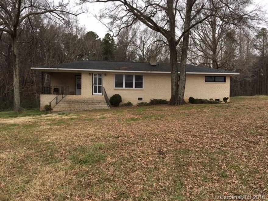 Full Brick. Wooded Lot. Great investment opportunity. Income potential. Needs some TLC. Convenient to I-77, I-85 and Northlake Mall.  Buyer to verify schools and square footage.