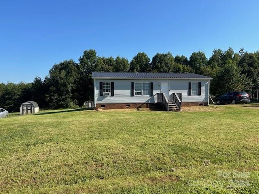 This 3 bedroom, 2 bathroom home offers the perfect blend of comfort and style. This home boasts open living areas and a serene outdoor space. The yard provides plenty of space to roam and garden. Newer metal roof installed 2021. Don't miss the chance to make this one your new home.