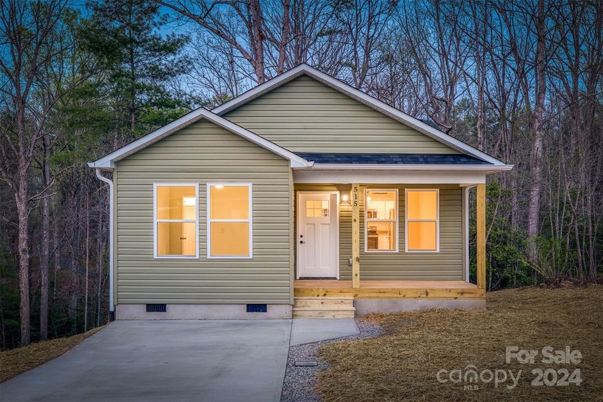 Welcome to this lovely new home nestled within a quiet neighborhood less than a half mile from Downtown Valdese. This location offers the perfect blend of tranquility and convenience. Enjoy the peaceful surroundings while still being in close proximity of restaurants, shops, and amenities. This charming home rests on a .42 acre lot and offers a one level with 2 bedrooms, 2 bathrooms, alongside a generously proportioned kitchen and living area. You'll love the big bedrooms, stainless steel appliances, and stylish vinyl plank flooring! Plus, enjoy the convenience of city water, city sewer, and the comfort of knowing it's a brand-new construction.