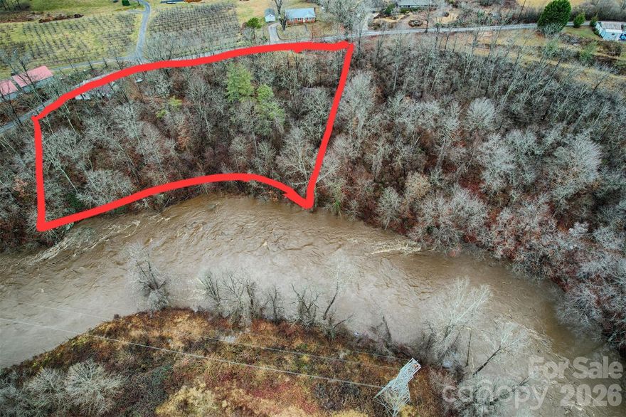 Discover the possibilities at 415 Pigeon Ford Road in Canton, NC — a peaceful riverfront property with space, privacy, and endless potential along the scenic Pigeon River. With no known restrictions, it’s perfect for your forever home, a small farm, or multiple home sites. Two existing structures will need to be removed, creating a blank canvas, and a septic system is already in place for added convenience. Enjoy the sounds of the river and the freedom to build your dream mountain retreat just minutes from town.