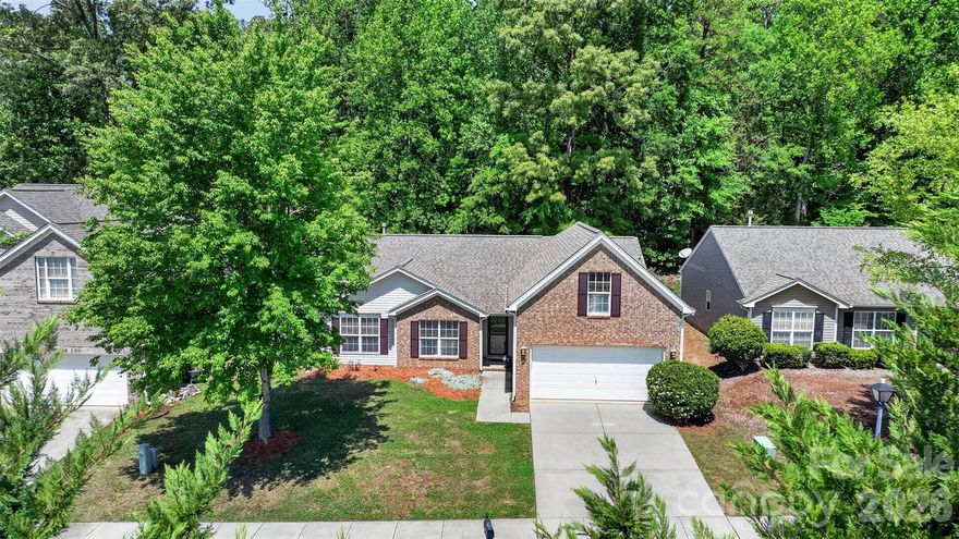 Welcome to this charming one-story home featuring a 2-car garage and a spacious finished bonus room over the garage—perfect for a home office, gym, media room, or flex space to suit your needs. As you enter, you’re greeted by an open floor plan filled with natural light, highlighted by hardwood floors in the foyer, dining room, living room, and hallways, along with elegant arches and a vaulted ceiling that add character and warmth.
The home offers a large dining room and a bright living room with vaulted ceilings that flows seamlessly into the kitchen—complete with a breakfast nook, peninsula bar for additional dining seating, granite countertops, 42-inch cabinets, deep single-bowl stainless steel kitchen sink and stainless steel appliances—ideal for both everyday living and entertaining. The primary suite features a vaulted ceiling, natural light, a walk-in closet, and an en-suite bath with dual vanity, a separate shower and garden tub. Two additional bedrooms provide ample space, while the versatile bonus room upstairs offers endless possibilities. Step outside to enjoy a fully fenced backyard featuring an oversized patio—perfect for entertaining—along with a retaining wall and steps that add both function and visual appeal to the outdoor space. Enjoy a prime location just minutes from shopping, dining, entertainment, and medical facilities along Hwy 521, including convenient access to Costco, Target and Sprouts. Benefit from low South Carolina county taxes while living in a community that offers fantastic amenities, including a pool, playground, basketball hoop and sidewalks.           

NO SHOWINGS UNTIL SATURDAY MAY 2ND AT 1PM
PLEASE REMOVE SHOES OR WEAR SHOE COVERS WHEN VIEWING HOME.