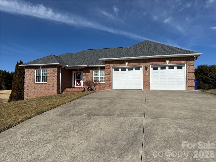 Gorgeous Home In Wonderful Neighborhood, Located in small subdivision tucked away just outside the city limits of Hudson, Convenient to Shopping and Dining with No City Taxes. This all brick home has many wonderful features, New Roof in 2025, Open Floor Plan with Large Living Area and Dining Area, Cathedral Ceilings, Brazilian Wood Flooring, Tile Flooring in Kitchen & Baths, Beautiful Galley Kitchen w/tray ceiling, Custom Cabinets w/Pullout Drawers & New Dishwasher, 3 1/2 Baths, Private Primary Bedroom w/Tray Ceiling, Private Exit to Deck/Patio, Primary Bath with Custom Cabinets, Soaking Tub and New Custom Walk-in Shower, Both Extra Bedrooms have Walk-In Closets, Living Room has Marble Gas Fireplace, Large Finished Basement is ready to be customized into a new living space and features a beautiful new full bath. Attached Double Garage plus Garage Space in Basement with Driveway, Partial Crawlspace is Encapsulated with Commercial Dehumidifier, Outside features fenced-in backyard, Corner Lot, Large Deck with Trex Decking and Patio. Owners have also updated the breaker box to accommodate expansion (Such as Hot Tub/Spa).