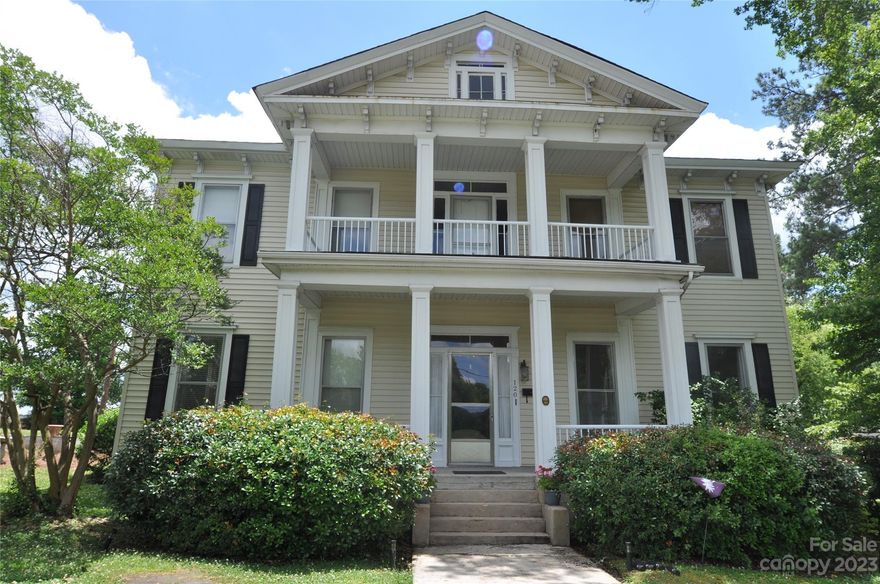 This 1854 registered Historic home has 5 bedrooms and 2 bathrooms, 4,554 sq ft, located on .47 acres.  Original 1854 features: doors, hardwood floors, windows, hardware, woodwork, high ceilings. Custom library with built-in bookshelves and gas log fireplace, formal living room and dining room both have fire places that are ceiled but could easily be opened, master bedroom on main has spacious walk in closet, large kitchen, corian countertops, all appliances included, eat-in dinette, 4 bedrooms upstairs, 3 additional rooms could be used for additional bedrooms, nursery, home offices, or workout room. Balcony located off 2nd floor hallway, dual HVAC units, detached carport and workshop, nice level lot.  Walking distance to downtown. Enjoy a serene lifestyle that is just a hop to Rock Hill and a 45 minute, easy commute to Charlotte and Columbia.