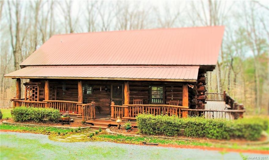 You'll feel liked you're in the mountains in this beautiful 1600 square foot Amish built log home on over 6 acres. Well cared for and a private setting.  2 bedrooms and 2 full baths. Balcony off upstairs bedroom. New Trane 16 SEER Earthwis Hybrid HVAC installed January 2017. Vaulted ceilings, great natural light. Wrap around porch- covered front and back. Detached garage can accommodate up to 4 vehicles. Schedule an appointment to see today!