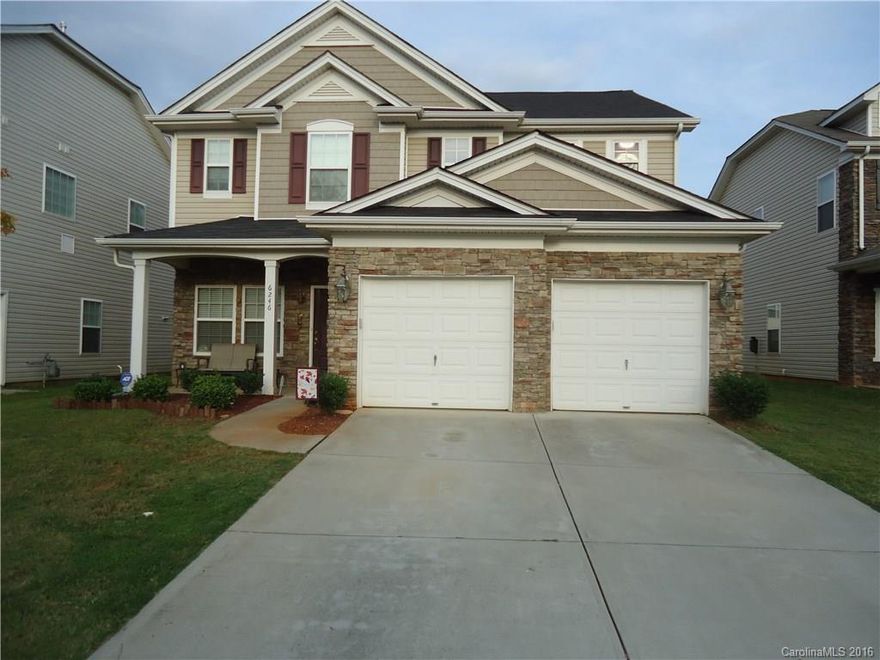 This stunning Charlotte home has all you could want an open concept floor plan.  Kitchen offers has granite counter tops, under cabinet lighting, wall oven and microwave, cook top, tile back-splash, 36” cabinet space and breakfast bar. Great room has cozy fireplace and built in bookcase making this the perfect room to kick back and relax. Beautiful hardwood flooring in the living room and dining room.