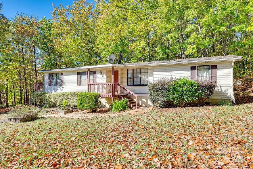 The country living and privacy you have always wanted. Home sits on over an acre of woods.  All systems are in good working order. New carpet in all three bedrooms.  Home will need to be detitled prior to getting a loan.  Johannesmeyer and Sawyer can handle well within any closing period.   This is a great opportunity to own a piece of land in an awesome school district and perfect location.