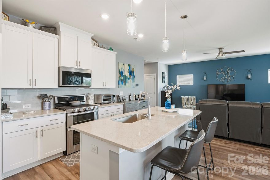 $2,000 Preferrred Lender Credit Available!

Welcome home to this beautifully maintained, energy-efficient 2021 Meritage Homes residence in the sought-after Larkhaven Hills community! This move-in-ready two-story home offers 3 bedrooms, 2.5 bathrooms, and 1,887 sq ft of open-concept living on a quiet cul-de-sac with one of the neighborhood’s longest driveways—easily fitting 4+ cars.

Inside, the bright, open main level is perfect for everyday living and entertaining. The gourmet kitchen features white/gray granite countertops, a large island, a walk-in pantry, and modern finishes. Upstairs, you’ll find a spacious primary suite with dual sinks, a walk-in shower, and generous closet space, plus two additional bedrooms, a full bath, and a versatile loft ideal for a home office, play area, or bonus space.

Modern touches include durable EVP flooring, plush multi-tone carpet, and thoughtful upgrades throughout. The 2-car garage offers built-in overhead storage, and the low-maintenance newer construction means more time to enjoy life. Added peace of mind comes with the HomeTeam Pest Defense in-wall system (exterior treatment injected directly into the walls) and a transferable termite bond.

Residents love the community amenities—clubhouse, outdoor pool, playground, sidewalks, street lights, and walking trails. Turn-key opportunity: Most furnishings and appliances (refrigerator, washer, dryer) are available for purchase, making this a truly move-in-ready home. Conveniently located on the edge of Mint Hill with quick I-485 access, you’re minutes from downtown Mint Hill, Charlotte shopping/dining, parks, and major employers.

This home offers comfort, convenience, and value in a family-friendly neighborhood. Don’t miss your opportunity—schedule a private showing today!