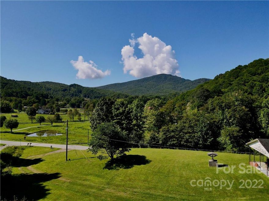 Only once in a generation does a property like this come up for sale. This centrally located Foscoe 9.19 acre property overlooks Grandfather Mountain, Grandfather Stables and the Church Road valley. Iconic mountain and valley views make for one of the High Country's most unique settings with gently sloping land. Centrally located to Boone, Banner Elk, Blowing Rock, the Blue Ridge Parkway, Grandfather Mountain and more. The property features an older ranch-style house that could be renovated and used as a guest house, short-term rental home, primary residence or caretakers home. Land would be conducive to a large estate home and has multiple building sites and over 600' of road frontage. Land can be subdivided per Watauga County guidelines and may be suitable for a short-term rental community, tiny home community, or cabin community. Home is being sold as-is. Foscoe has light zoning which requires 1 acre per home and may limit some commercial uses. Short-term rentals are allowed.