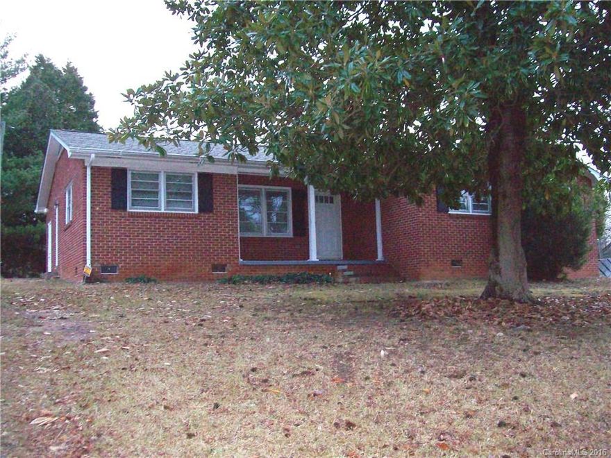 3BR/1.5BA brick ranch on .75+/- Ac, lots of beautiful hardwood floors, formal living. 2 detached storage buildings. NICE!!!