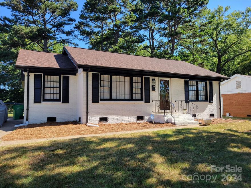 Beautifully updated and partially renovated home.  Improvements include bathroom updates, freshly painted interior and exterior of home, and refinished hardwood floors throughout.  Set on spacious lot with large fenced back yard with outdoor storage shed.  Conveniently located to I-85, Uptown, UNC Charlotte and light rail line.  No HOA fees!