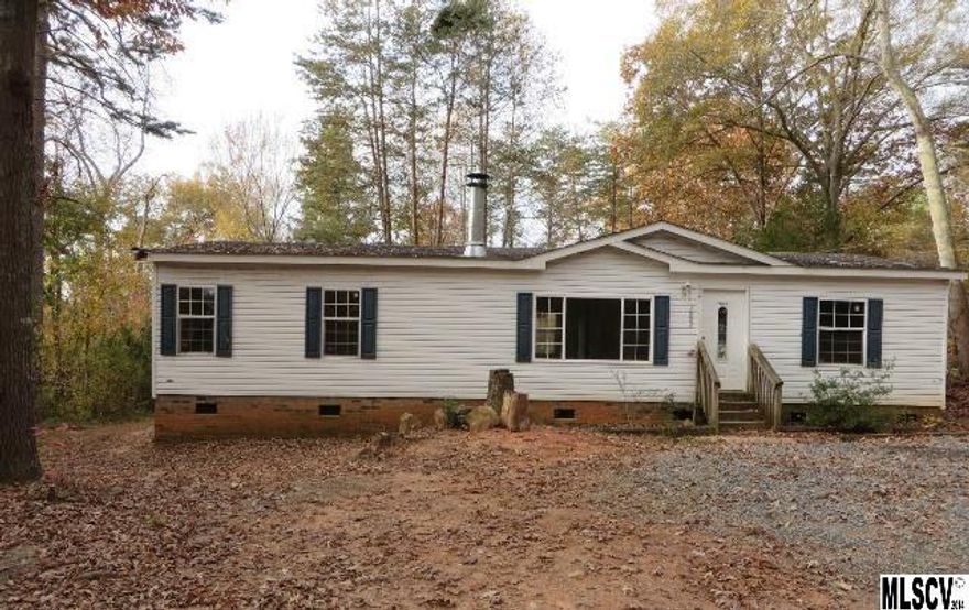 Priced to Sale @ 50% of tax value & conveniently located to Charlotte!  Check out the almost 14000 square feet of living space offering a den w/fireplace & kitchen w/plenty of cabinet space and ample size dining room .   Master Suite offers walk in closet, garden tub, shower & dual vanities.  Just outside of Stanly/Mt Holly Area and only 10 minutes from Hwy 16 makes this home an easy commute.  Needs some TLC.