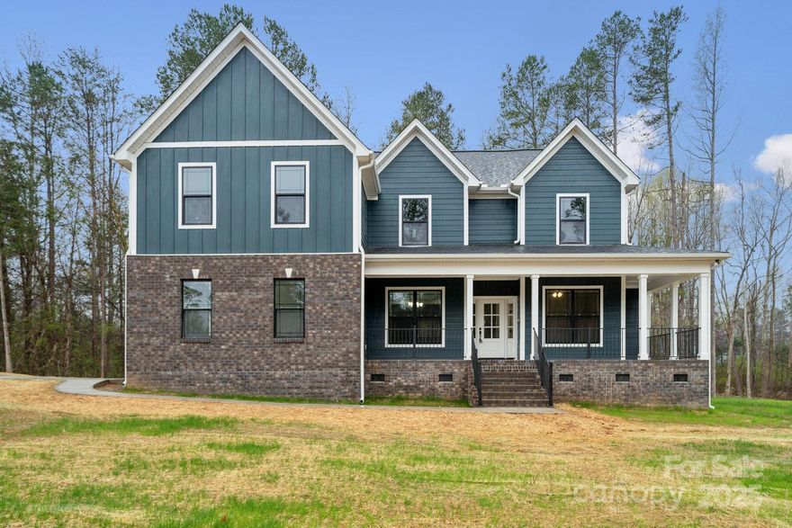 This is the one you have been waiting for! Newly completed construction, located just under 2 miles from the center of town, and just minutes from the Lake Wylie area will give you the convenience of local shopping, restaurants and parks with the privacy you've been looking for. Truly a hidden gem! This beautiful custom built home sits on 4.5 acres with its own pond. The stunning 4 bedroom, 2 1/2 bath home boasts a large back porch with a view of the pond, perfect for drinking your coffee or entertaining guests. Features include Pella windows, a tankless gas water heater and ventless gas fireplace. This home has beautiful, bright color choices and gorgeous countertops and fixtures. With a very large bonus room, an office, 2 pantries, a large laundry room and dining area you will have all the space you need. You get all of this in the award-winning Clover School District.