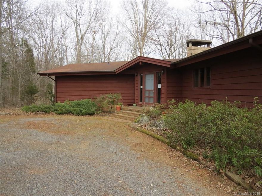 Sprawling Contemporary Ranch With Mountain-Like Setting. Front Door Entry with Brick Floor Leading to Hardwood Floors. Great Room with Brick Masonry Fireplace. Study With Built-In Shelves. Large Windows With Views of Wooded Area. Master Suite on Main Level. Brick Wall Leading to Lower Level Great Room with Masonry Fireplace. Large Deck.  Landlord will maintain the pasture. On 49 Acres