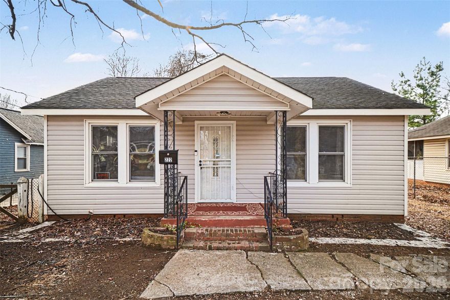 Opportunity in growing 28216! This 2-bedroom, 1-bath bungalow offers 957 heated square feet on a generous 0.24-acre lot. Built in 1939, this property provides excellent potential for investors, renovators, or first-time buyers looking to build equity.

Inside, you’ll find original wood floors and dedicated living and dining areas, both flooded with natural light! Functional kitchen has pantry cabinet & electric range plus access to laundry. 2 bedrooms provide option for guest space or home office / hobby room. The spacious backyard has partial fencing and a storage shed perfect for outdoor equipment + room to expand or create outdoor living space.

For investors, this is a strong rental, value-add, or redevelopment opportunity in an area seeing continued growth and revitalization. For first-time buyers, this home offers an affordable entry point into homeownership with room to personalize and improve over time.

No HOA and located just minutes from Uptown Charlotte, major highways, and everyday amenities making this a convenient home for commuting to work or weekend activities.