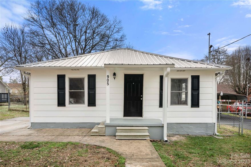 Experience the charm of this cozy cottage that is the perfect place to call home.  The house has been renovated before going on the market.  The kitchen features new stainless-steel appliances, new cabinets, and a breakfast area.  The primary bedroom is conveniently located off the family room and the secondary bedroom is located beside the full bath and has a walk-in closet.  The half bath has hook-ups for the washer and dryer.  Exiting the back door, you will find a brand-new wooden deck that takes you into a wonderful fenced in back yard.  The property has easy access to nearby amenities such as shopping, dining and schools.  New LVP flooring has been installed throughout the house, new paint throughout, new toilets, and pedestal sinks.  If you are looking for a property that is not in a subdivision and does not have an HOA, then this may be the home to consider.