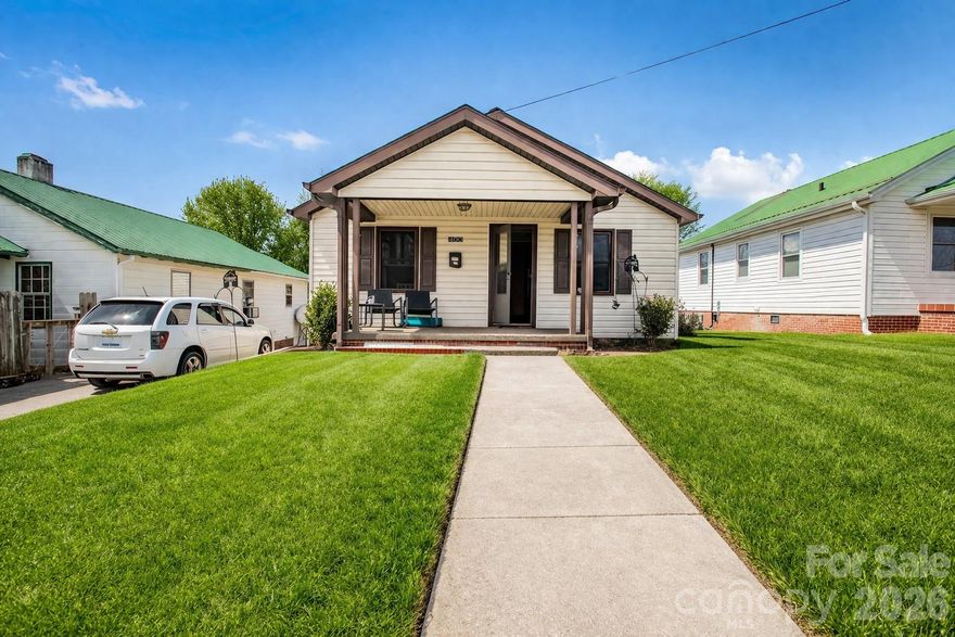 Motivated sellers! Perfect for a full-time residence, retirement home, investment property, or short-term rental (VRBO). No restrictions. Enjoy peaceful mountain living with small-town convenience. *Some images are virtually staged and groomed.*

Charming 1930s cottage in the heart of Spruce Pine! This move-in ready, single-level home features 2 bedrooms, 1 bathroom, hardwood floors, central heat, and all appliances included. A new roof installed in 2024 adds peace of mind and long-term value. Enjoy relaxing on the covered front porch while taking in the cool mountain breezes and scenic views.

The property offers a level lot with easy access, shared driveway, plus a detached garage and additional storage building, providing plenty of space for tools, hobbies, or outdoor gear.

Located in the quaint riverside town of Spruce Pine, this home is within walking distance to downtown and Riverside Park, where you can enjoy fly fishing, kayaking, swimming, playgrounds, and picnic areas along the river. Schools, medical facilities, and shopping are just minutes away.