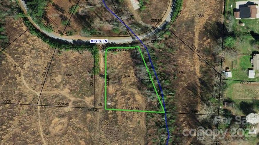 Large lot in the lakefront community of Whistle Peace. Seasonal lake views from just across the street. Most of lot is cleared meadow. Snow Creek, Arndt, St. Stephens school district. County taxes. Specific Architectural Restrictions.