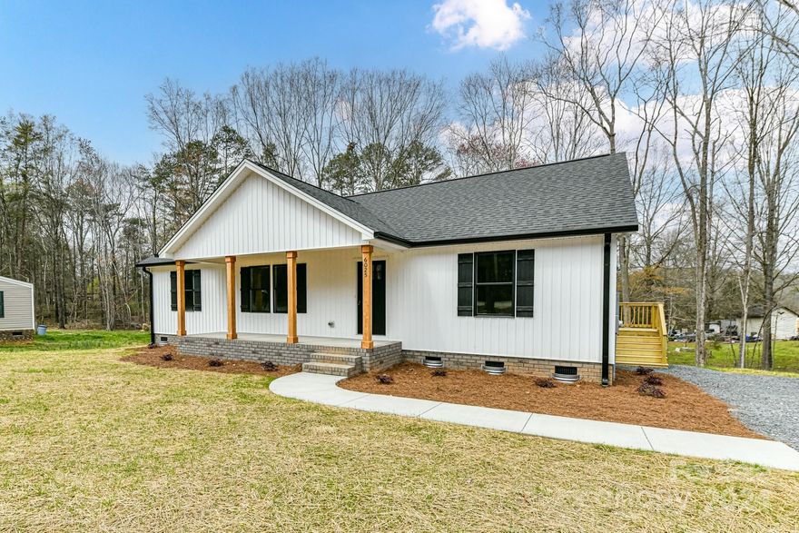 New Construction Modern Farm House! Adorable ranch plan on over an acre. Quality built construction ready to move in! Maintenance Free Vertical Board and Batten style vinyl siding and black windows and gutters. 3 BR, 2 BA split bedroom plan. Large open living space in center of house with French doors leading to 12x16 deck perfect for entertaining or grilling.  Large kitchen, custom soft close cabinets/drawers with large center island with plenty of bar space and seating. Stainless higher end appliances. Huge dining area with room for large farm style table.  Generous primary bedroom, walk in closet with dual vanity sinks with granite tops and tiled walk in shower with glass door to be installed.  2 additional bedrooms that share bathroom.  Covered front porch ready for swing or rockers.  Make this new house your home!!  New Salem Elementary and Piedmont Middle and High Schools.  NO HOA. Plenty of Space for Detached Garage or Building.