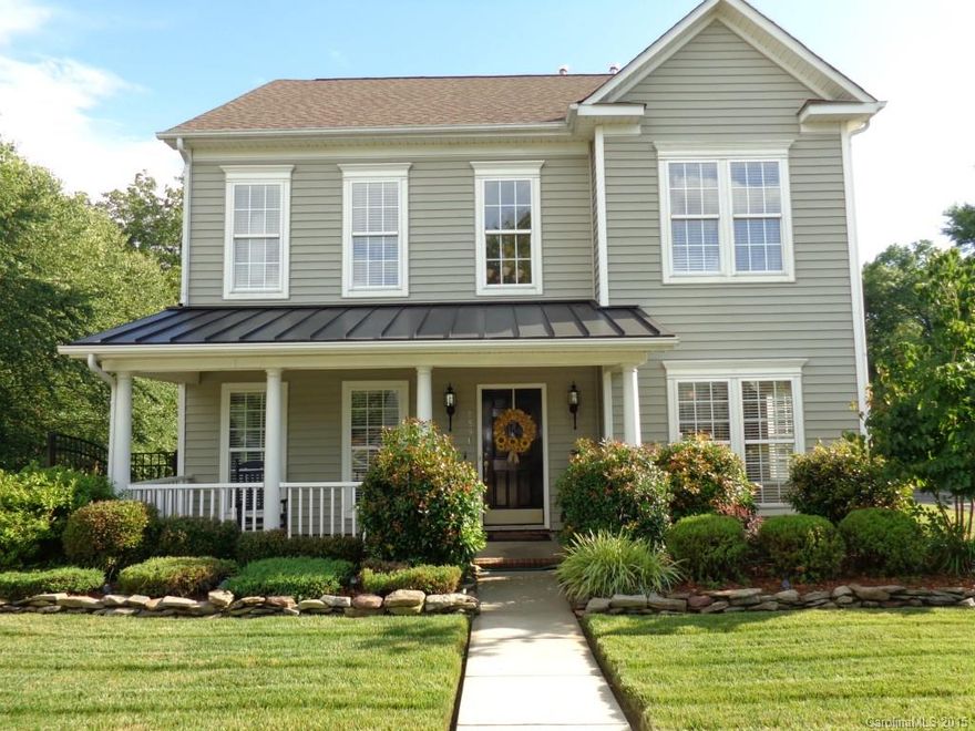 Wow is what you will say when you see this house.  Surround sound throughout the home, theatre room, inground heated pool, hot tub, waterfountain,landscaping is beautiful.  Home has French doors, formal dining room, kitchen,family room.  Uptairs you have a lare Master bedroom and master bath.  The other stairs lead you to a theatre room with running lights.