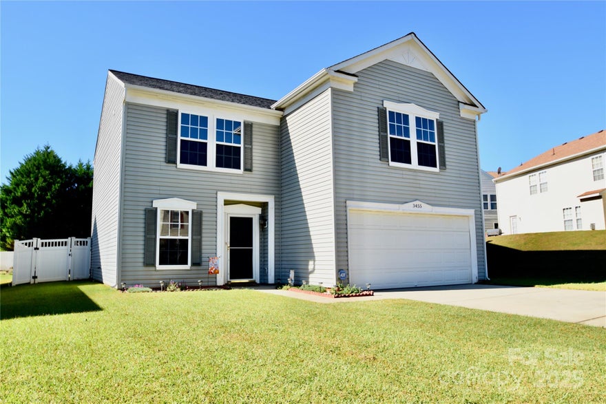 Welcome home to 3455 Table Rock Drive located within the highly desirable Crowders View community! This beautiful 2-story transitional home offers 3 bedrooms, 2.5 baths, and is move-in ready. The main level showcases an open-concept floor plan, featuring a spacious living room that flows seamlessly into the dining area and updated kitchen. Step inside to discover brand-new Luxury Vinyl Plank (LVP) flooring throughout the first floor, providing a fresh and modern feel. The kitchen boasts new stainless steel appliances, making meal prep a joy. Upstairs, the primary bedroom suite is a true retreat, featuring an updated private bathroom with a two-sink vanity. All bathrooms have been stylishly updated for a fresh, clean look. The second floor also features a versatile loft area, currently used as a comfortable family room—perfect for movie nights or a home office. Enjoy peace of mind knowing the roof was replaced in 2023! Outside, the home features a large, fully fenced-in backyard, ideal for pets, play, and outdoor entertaining. Located minutes from local amenities and  I-85, this home perfectly blends updated features with community living. Don't miss this opportunity! Come see for yourself...