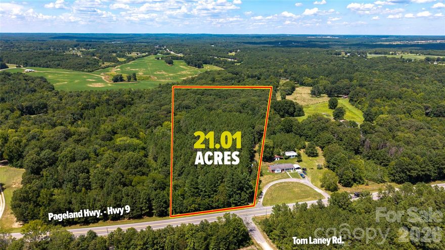 Nestled just off Pageland Highway, this unique property offers a rare blend of seclusion, usability, and potential. As you enter through the gated entrance, you’re greeted by a private drive surrounded by mature pine trees that opens to several flat, buildable areas, ideal for your dream home, retreat, or investment opportunity. A 40-foot school bus (with seats removed) sits on-site and invites endless creative uses, think studio, reading nook, or storage. Already perked and ready for your vision, this blank canvas spans 21 acres and even crosses the serene Wild Cat Creek in the back corner, perfect for fishing, relaxing, or soaking in the sounds of nature. Conveniently located between Lancaster and Pageland, this one-of-a-kind property offers the privacy of rural living with access to nearby town amenities. Bring your imagination, this land is ready for it.