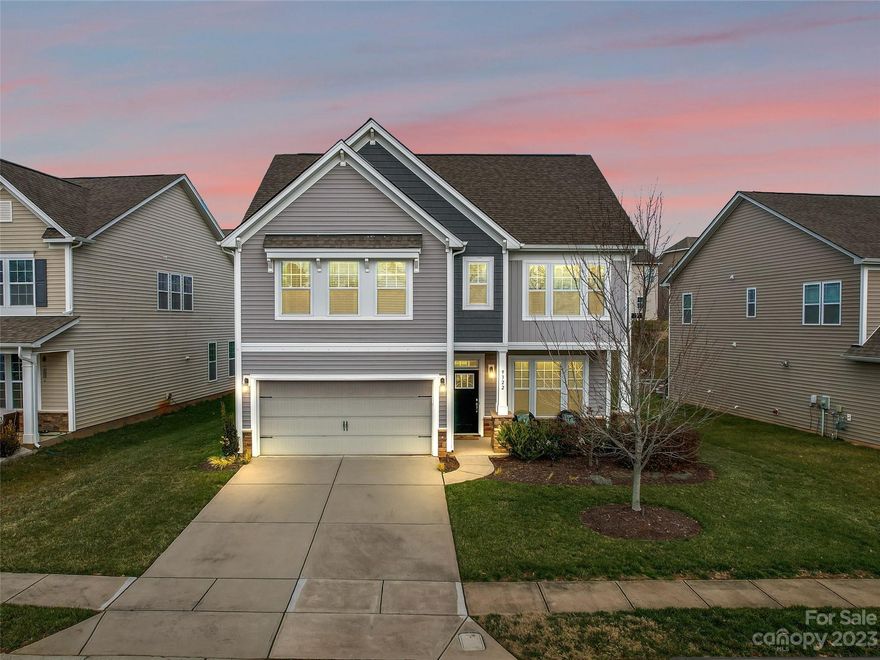 This 2017 Verwood floor plan has 3 bedrooms plus a loft, 2.5 baths, and plenty of upgrades throughout. The first floor open concept gives you a large family room with built-in speaker system, a cozy sunroom and a beautiful formal dining room with an upgraded coffered ceiling.  The kitchen provides a gas range, granite countertops and stainless appliances. The second floor features a very large owner’s suite with upgraded bath and a spacious walk-in closet, 2 sizable guest bedrooms, laundry room, and a comfy loft with built-in surround sound. Outside of the home you have a custom landscape package and 5 zone irrigation system. Miles of walking trails, 2 neighborhood pools, a gym, a playground, beach volleyball, and a tennis court are just some of the amenities included with the HOA. You're located within 1 mile of multiple restaurants, a grocery store, and the Charlotte Premium Outlets. 15 minutes from the airport and less than 20 minutes to uptown Charlotte. The location can’t be beat.