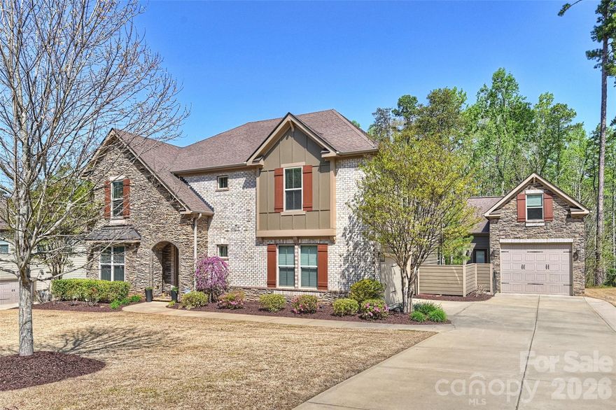 Welcome to 294 S San Agustin Dr, a spacious 4-bedroom home set on a beautifully private .78 acre lot in one of Mooresville’s most desirable communities. Enjoy a rare setting with no homes directly in front or behind you.

A standout feature is the detached garage offering 647 square feet of heated and cooled space—ideal for a car enthusiast, workshop, home gym, or boat storage. Above the garage, you’ll find an additional 407 square feet, perfect for storage or a private office, already wired for a mini split. In total, the property offers 4–5 garage spaces, providing exceptional flexibility.

The main level features a welcoming two-story foyer that opens to a formal dining room and flows seamlessly into the breakfast area and kitchen. A dedicated office creates the perfect work-from-home space, while the open layout is ideal for both everyday living and entertaining.

Upstairs, you’ll find a versatile loft, three secondary bedrooms, two full baths, and a spacious primary suite with a massive walk-in closet. The spa-like primary bath includes dual vanities, a soaking tub, and a large tiled shower. A generously sized laundry room adds everyday convenience.

Step outside to a private backyard retreat featuring a large covered porch with a swing and BBQ area—perfect for relaxing or entertaining. The property also includes a shed with electricity, ideal for a she-shed, hobby space, or additional storage.

Recent updates and features include a whole-house water filtration system and softener, fresh exterior paint (2026), water heater (2025), updated carpet and interior paint, and new fixtures throughout.

Residents enjoy resort-style amenities including a Junior Olympic pool, tennis, basketball, and pickleball courts, playgrounds, and a scenic walking path to Lake Norman.

Conveniently located just minutes from Lake Norman, Stumpy Creek, shopping, dining, and I-77, this home offers the perfect blend of space, privacy, and lifestyle.