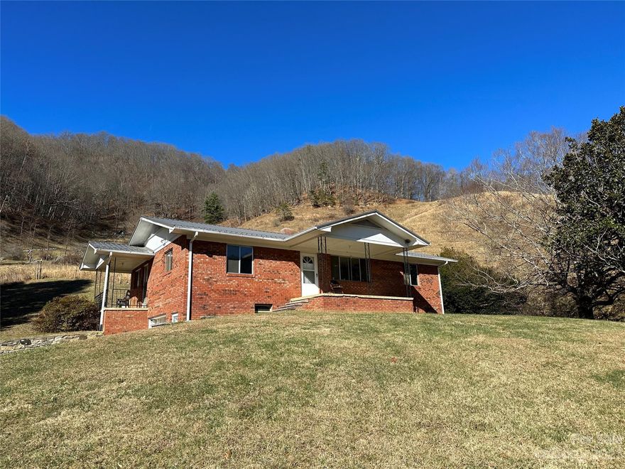 Beautiful 45 +/- acres farm located in the crabtree section of Haywood County comes with a stream 3 barns, hay shed, equipment shed and an enclosed work shop. The home has 3 bedrooms 2 baths a full basement, wood furnace, covered front porch to enjoy the mountain views from. plenty of fenced pasture for horses or cattle. This type property does not come up for sale very often so don't miss out!